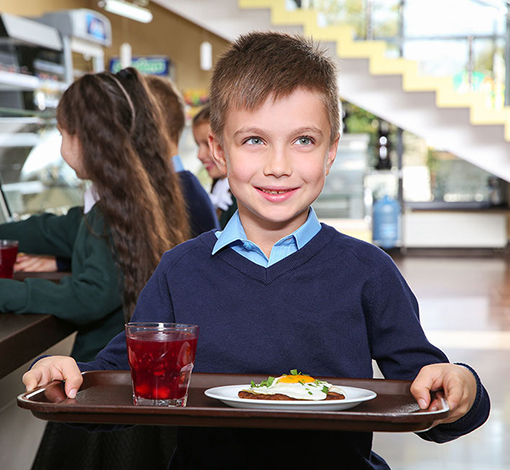 content-image-young-boy-holding-tray
